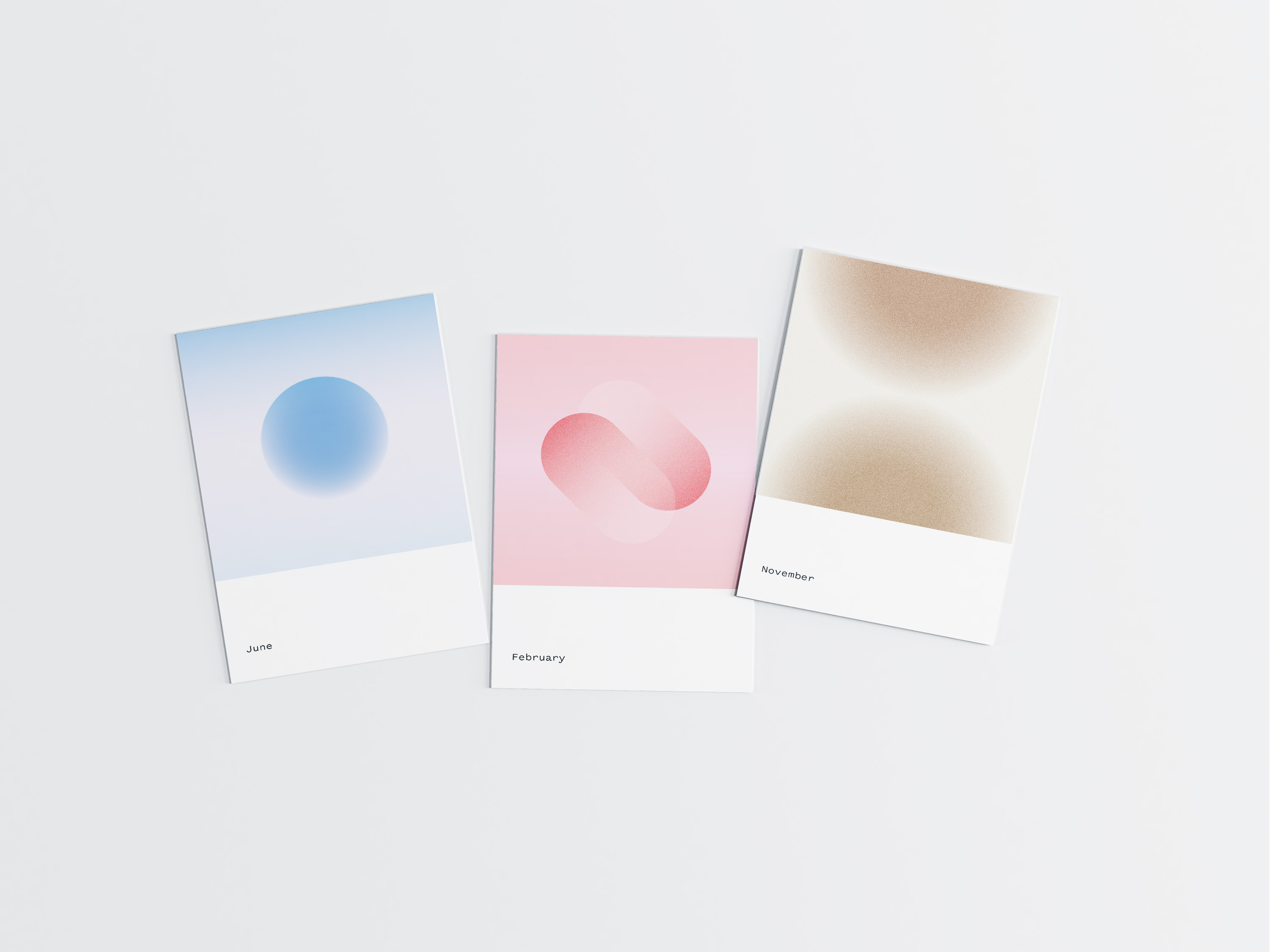 Set of 3 cards with soft gradient graphics laid out flat