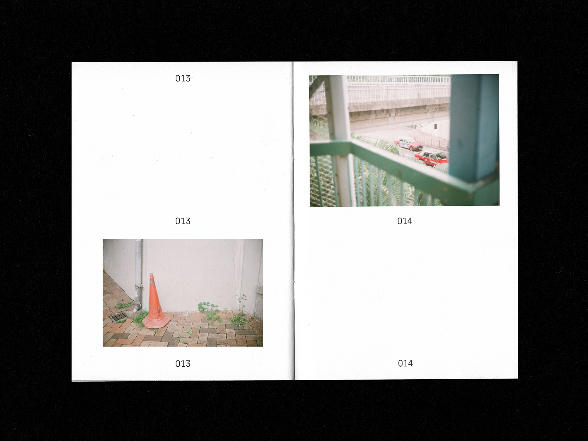 Spreads of zine: left image - traffic cone on floor; right image - taxis passing by taken from elevated footwalk